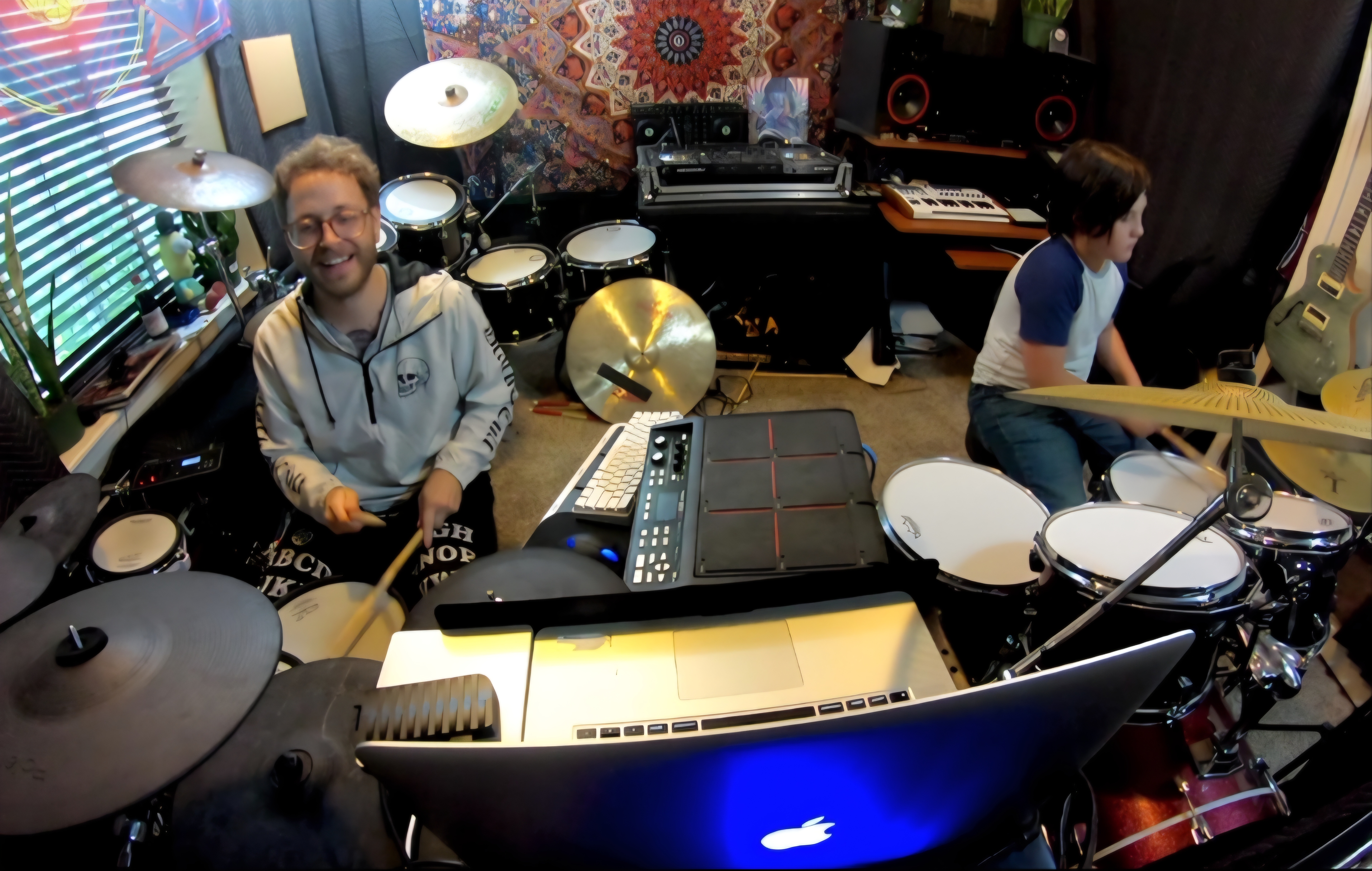 Drum student playing with Daniel
